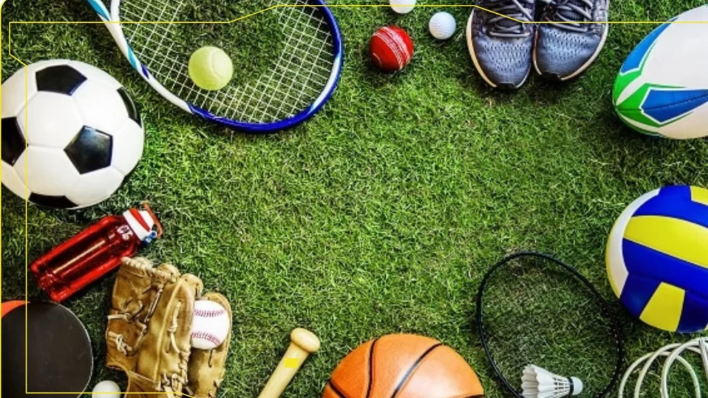 Various sports equipment on grass field—CNC machining in manufacturing of precision sports gear and athletic accessories